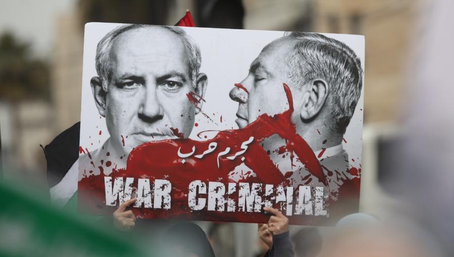 لافتة رفعت في المسيرة الاحتجاجية في محيط السفارة الأمريكية في عمّان 23/2/2024