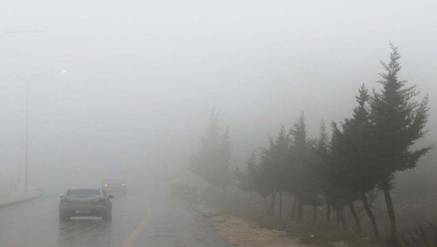 شارع رئيسي في العاصمة عمان خلال جو ماطر