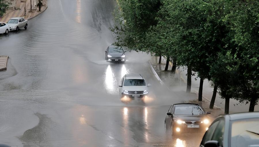 أمطار في أحد شوارع عمان | بترا