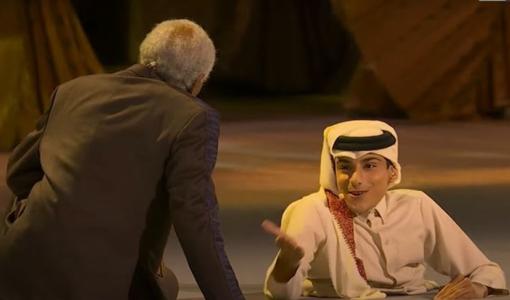 غانم المفتاح مع الممثل مورغان فريمان في حفل افتتاح كأس العالم