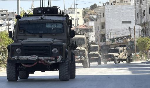 آليات ومدرعات جيش الاحتلال خلال أحد الاقتحامات السابقة في الضفة | المصدر: الأناضول