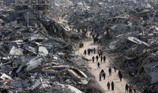 نازحون غزيون يعودون إلى مخيم جباليا شمال غزة بعد وقف إطلاق النار نازحون غزيون يعودون إلى مخيم جباليا شمال غزة بعد وقف إطلاق النار | المصدر: وكالة الأنباء الفرنسية