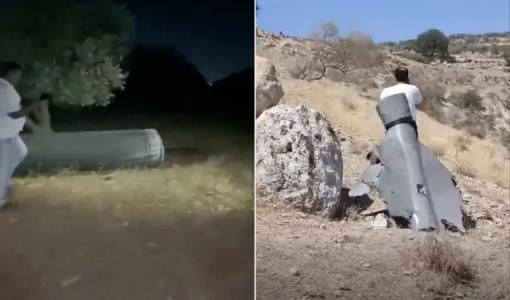 شظايا مسيرة غرب مدينة إربد (يمين) وبقايا صاروخ في منطقة خالية بقرية حريما في لواء بني كنانة بمحافظة إربد شظايا مسيرة غرب مدينة إربد (يمين) وبقايا صاروخ في منطقة خالية بقرية حريما في لواء بني كنانة بمحافظة إربد