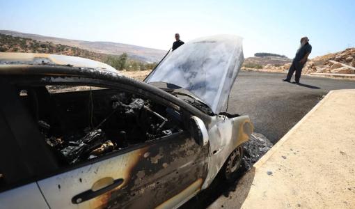 سيارة أحرقها مستوطنون في قرية الطيبة بالقرب من رام الله بالضفة الغربية | أرشيفية الوكالة الأوروبية للصور الصحفية