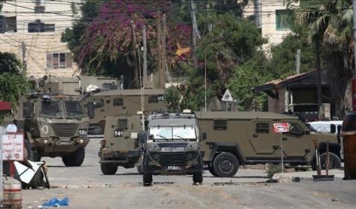 مدرعات الاحتلال خلال اقتحام سابق للضفة الغربية | المصدر: الأناضول