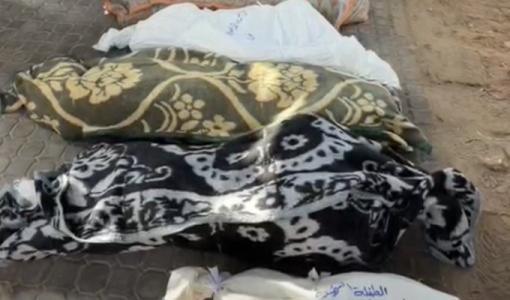جثث محترقة لعائلة كاملة من 6 أفراد أبيدت فجر اليوم إثر قصف طيران الاحتلال الإسرائيلي منزلا في شارع الثلاثيني جنوب مدينة غزة | مواقع التواصل الاجتماعي