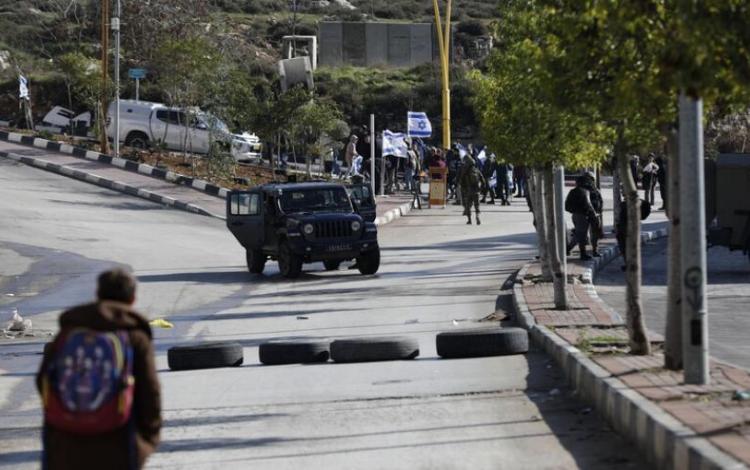 جيش الاحتلال أثناء تأمين مسيرة سابقة للمستوطنين | الأناضول