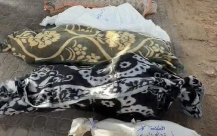جثث محترقة لعائلة كاملة من 6 أفراد أبيدت فجر اليوم إثر قصف طيران الاحتلال الإسرائيلي منزلا في شارع الثلاثيني جنوب مدينة غزة | مواقع التواصل الاجتماعي